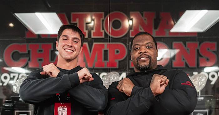 Ashton Murphy and Nebraska defensive line coach Terrance Knighton